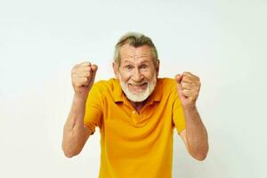 Photo of retired old man hand gesture gray beard fun monochrome shot