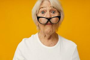 Photo of retired old lady vision problems with glasses close-up emotions