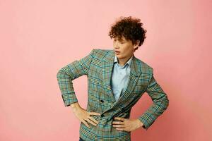 guy with red curly hair in a suit business look posing emotions Lifestyle unaltered photo