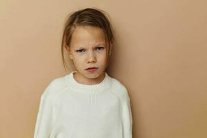 Portrait of happy smiling child girl childrens style emotions fun isolated background photo