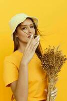 beautiful girl bouquet of dried flowers casual wear smile posing Lifestyle unaltered photo