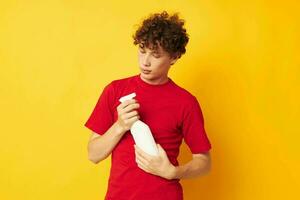 guy with red curly hair detergents home care posing isolated background unaltered photo