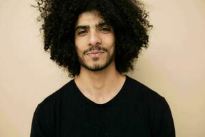 man with curly hair stylish hairstyle casual wear Lifestyle unaltered photo