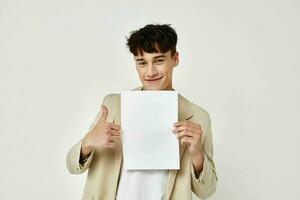 Photo young boyfriend posing jacket emotions copy-space light background unaltered