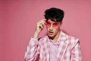 Photo of romantic young boyfriend self confidence pink plaid blazer fashion posing model studio