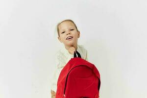 cute girl school red backpack posing childhood unaltered photo