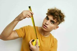 kinky guy grimace measuring tape posing isolated background photo