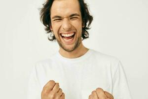 Attractive man in white t-shirt fashion cropped view isolated background photo