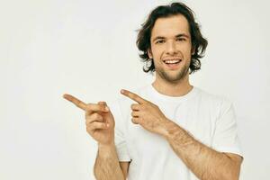 handsome man in white t-shirt fashion cropped view light background photo