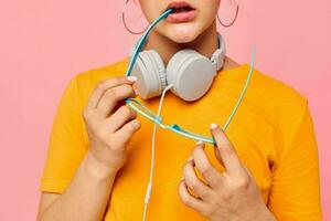 funny girl wearing headphones blue glasses close-up emotions isolated backgrounds unaltered photo