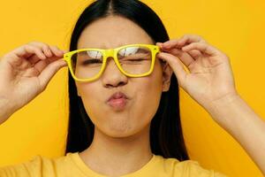 pretty brunette in glasses gesturing with hands copy-space Monochrome shot photo