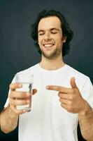 handsome man transparent glass of water health Lifestyle unaltered photo