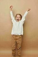 cute girl in white sweater posing hand gestures childhood unaltered photo