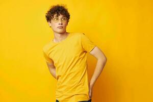 portrait of a young curly man Youth style glasses studio casual wear monochrome shot photo