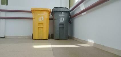 Object photography - 2 pieces Gray and yellow trash cans photo