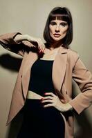 attractive woman in a beige jacket elegant style posing Lifestyle unaltered photo