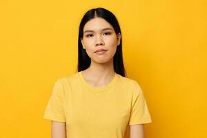 pretty asian woman in yellow t-shirt monochrome photo