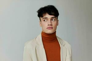 Young man on white suit photo