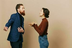 Man and woman couple in a relationship quarrel, yelling, psychological violence in the family, problems in a real relationship between people photo