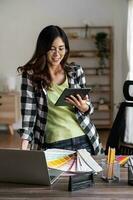 Verticla image of graphic designer working with tablet for creativity editor ideas designer concept. photo
