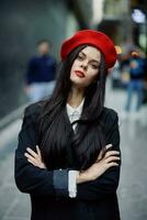 Fashion woman portrait walking tourist in stylish clothes with red lips walking down narrow city street, travel, cinematic color, retro vintage style, dramatic look without smile sadness. photo