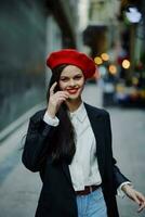 Fashion woman smile with teeth portrait stroll tourist in stylish clothes with red lips walking down narrow city street curves, travel, cinematic color, retro vintage style, Valentine's Day. photo