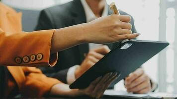 Team of business people working together in the meeting room office, teamwork background charts and graphs banner, double exposure successful teamwork,business planning concept. video