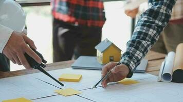 Construction and structure concept of Engineer or architect meeting for project working with partner and engineering tools on model building and blueprint in working site, contract for both companies. video