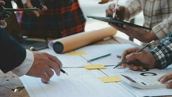 Construction and structure concept of Engineer or architect meeting for project working with partner and engineering tools on model building and blueprint in working site, contract for both companies. video