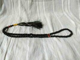 A black tasbih for Muslim prayers photo