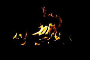 Fire flame texture. Burning material backdrop. Burn effect pattern. Blaze and torch wallpaper. Heat and haze backdrop. photo