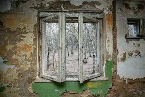 Hungarian aged lost place in the forest. Ex soviet, abandoned army base barracks and associated buildings. photo