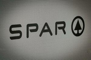 Dutch multinational retail chain and franchise Spar logo and sign in store photo