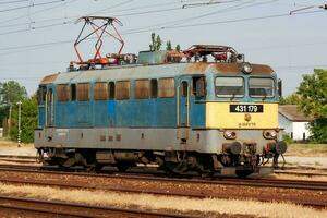 International train transportation. Locomotive train at station. Global railway transport and shipping. photo