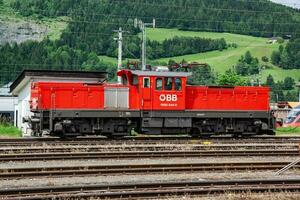 International train transportation. Locomotive train at station. Global railway transport and shipping. photo