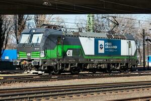 International train transportation. Locomotive train at station. Global railway transport and shipping. photo