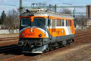 International train transportation. Locomotive train at station. Global transport and shipping. photo