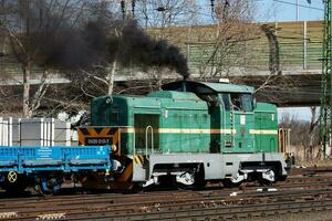 International train transportation. Cargo freight train wagon at train station. Global transport and shipping. photo