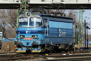 International train transportation. Locomotive train at station. Global railway transport and shipping. photo