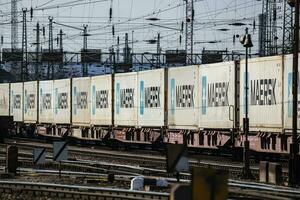 Maersk. Cargo train. Railways transportartion. Railway transport. Global and international freight transportation industry. photo