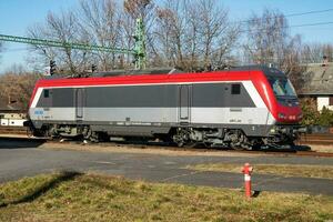 International train transportation. Locomotive train at station. Global railway transport and shipping. photo