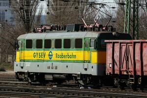 International train transportation. Cargo freight train wagon at train station. Global transport and shipping. photo