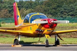 Military trainer plane at air base. Air force flight operation. Aviation and aircraft. Air defense. Military industry. Fly and flying. photo