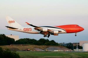 TNT Airways Boeing 747-400 OO-THB cargo plane landing at Liege Airport photo