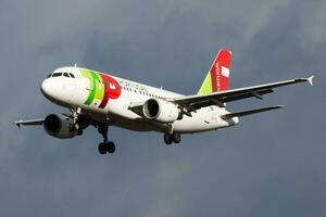 TAP Air Portugal Airbus A319 CS-TTI passenger plane landing at Frankfurt Airport photo