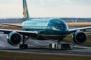 Vietnam Airlines Boeing 777-200 VN-A149 passenger plane taxiing at Frankfurt Airport photo