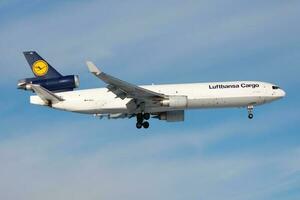 Lufthansa Cargo MD-11 D-ALCJ cargo plane landing at Frankfurt Airport photo