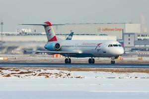 Austrian Airlines Fokker 100 OE-LVJ passenger plane departure at Frankfurt Airport photo