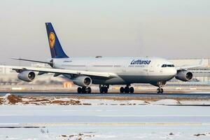 Lufthansa Airbus A340-300 D-AIGT passenger plane departure at Frankfurt Airport photo