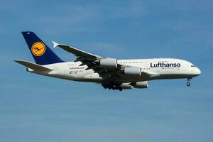 Lufthansa Airbus A380 D-AIMF passenger plane landing at Frankfurt Airport photo